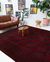 Antique Turkmen rug in a living room setting, pile rug, Turkish rug, vintage rug, portland, rug shop, bright colors, wild shaman, soft rug, bold color, Portland, Oregon, rug store, rug shop, local shop, antique rug