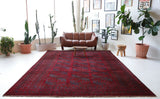 Antique Turkmen rug in a living room setting, pile rug, Turkish rug, vintage rug, portland, rug shop, bright colors, wild shaman, soft rug, bold color, Portland, Oregon, rug store, rug shop, local shop, antique rug