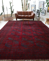 Antique Turkmen rug in a living room setting, pile rug, Turkish rug, vintage rug, portland, rug shop, bright colors, wild shaman, soft rug, bold color, Portland, Oregon, rug store, rug shop, local shop, antique rug