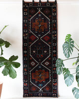 Vintage Turkish runner rug in a living room setting, pile rug, Turkish rug, vintage rug, portland, rug shop, bright colors, wild shaman, soft rug, bold color, Portland, Oregon, rug store, rug shop, local shop