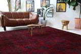 Antique Turkmen rug in a living room setting, pile rug, Turkish rug, vintage rug, portland, rug shop, bright colors, wild shaman, soft rug, bold color, Portland, Oregon, rug store, rug shop, local shop, antique rug