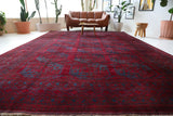 Antique Turkmen rug in a living room setting, pile rug, Turkish rug, vintage rug, portland, rug shop, bright colors, wild shaman, soft rug, bold color, Portland, Oregon, rug store, rug shop, local shop, antique rug