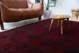 Antique Turkmen rug in a living room setting, pile rug, Turkish rug, vintage rug, portland, rug shop, bright colors, wild shaman, soft rug, bold color, Portland, Oregon, rug store, rug shop, local shop, antique rug