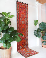 Vintage Turkish runner rug in a living room setting, pile rug, Turkish rug, vintage rug, portland, rug shop, bright colors, wild shaman, soft rug, bold color, Portland, Oregon, rug store, rug shop, local shop