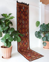 Vintage Turkish runner rug in a living room setting, pile rug, Turkish rug, vintage rug, portland, rug shop, bright colors, wild shaman, soft rug, bold color, Portland, Oregon, rug store, rug shop, local shop