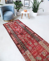 Vintage Turkish runner rug in a living room setting, pile rug, Turkish rug, vintage rug, portland, rug shop, bright colors, wild shaman, soft rug, bold color, Portland, Oregon, rug store, rug shop, local shop