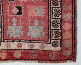 Vintage Turkish runner rug in a living room setting, pile rug, Turkish rug, vintage rug, portland, rug shop, bright colors, wild shaman, soft rug, bold color, Portland, Oregon, rug store, rug shop, local shop