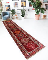 Vintage Turkish runner rug in a living room setting, pile rug, Turkish rug, vintage rug, portland, rug shop, bright colors, wild shaman, soft rug, bold color, Portland, Oregon, rug store, rug shop, local shop,
