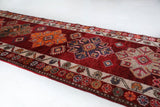 Vintage Turkish runner rug in a living room setting, pile rug, Turkish rug, vintage rug, portland, rug shop, bright colors, wild shaman, soft rug, bold color, Portland, Oregon, rug store, rug shop, local shop,