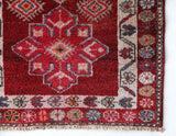 Vintage Turkish runner rug in a living room setting, pile rug, Turkish rug, vintage rug, portland, rug shop, bright colors, wild shaman, soft rug, bold color, Portland, Oregon, rug store, rug shop, local shop,