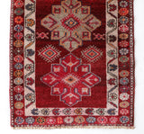 Vintage Turkish runner rug in a living room setting, pile rug, Turkish rug, vintage rug, portland, rug shop, bright colors, wild shaman, soft rug, bold color, Portland, Oregon, rug store, rug shop, local shop,