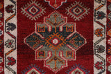 Vintage Turkish runner rug in a living room setting, pile rug, Turkish rug, vintage rug, portland, rug shop, bright colors, wild shaman, soft rug, bold color, Portland, Oregon, rug store, rug shop, local shop,