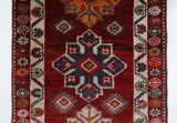 Vintage Turkish runner rug in a living room setting, pile rug, Turkish rug, vintage rug, portland, rug shop, bright colors, wild shaman, soft rug, bold color, Portland, Oregon, rug store, rug shop, local shop,
