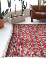 Vintage kilim rug in living room setting, bright colors, wild shaman, soft rug, bold color, Portland, Oregon, rug store, rug shop, local shop, vintage rug, modern kilim, warm colors