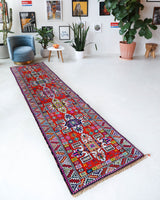 Vintage Turkish runner rug in a living room setting, pile rug, Turkish rug, vintage rug, portland, rug shop, bright colors, wild shaman, soft rug, bold color, Portland, Oregon, rug store, rug shop, local shop,