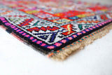 Vintage Turkish runner rug in a living room setting, pile rug, Turkish rug, vintage rug, portland, rug shop, bright colors, wild shaman, soft rug, bold color, Portland, Oregon, rug store, rug shop, local shop,