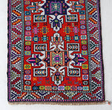 Vintage Turkish runner rug in a living room setting, pile rug, Turkish rug, vintage rug, portland, rug shop, bright colors, wild shaman, soft rug, bold color, Portland, Oregon, rug store, rug shop, local shop,