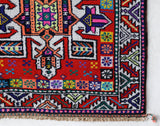 Vintage Turkish runner rug in a living room setting, pile rug, Turkish rug, vintage rug, portland, rug shop, bright colors, wild shaman, soft rug, bold color, Portland, Oregon, rug store, rug shop, local shop,