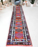 Vintage Turkish runner rug in a living room setting, pile rug, Turkish rug, vintage rug, portland, rug shop, bright colors, wild shaman, soft rug, bold color, Portland, Oregon, rug store, rug shop, local shop,