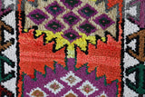 Vintage Turkish runner rug in a living room setting, pile rug, Turkish rug, vintage rug, portland, rug shop, bright colors, wild shaman, soft rug, bold color, Portland, Oregon, rug store, rug shop, local shop,