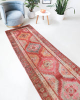 Vintage Turkish runner rug in living room setting, old rug, antique rug, pastel colors, faded colors, Turkish rug, vintage rug, soft rug, Portland, Oregon, rug store, rug shop, local shop