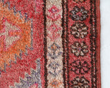 Vintage Turkish runner rug in living room setting, old rug, antique rug, pastel colors, faded colors, Turkish rug, vintage rug, soft rug, Portland, Oregon, rug store, rug shop, local shop