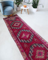 Vintage Turkish runner rug in a living room setting, pile rug, Turkish rug, vintage rug, portland, rug shop, bright colors, wild shaman, soft rug, bold color, Portland, Oregon, rug store, rug shop, local shop