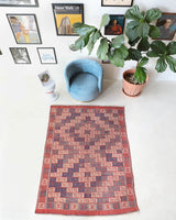 Vintage kilim rug in room decor setting, old rug, antique rug, pastel colors, faded colors, Turkish rug, vintage rug, soft rug, Portland, Oregon, rug store, rug shop, local shop, bold colors, bright colors, faded colors