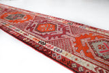 Vintage Turkish runner rug in a living room setting, pile rug, Turkish rug, vintage rug, portland, rug shop, bright colors, wild shaman, soft rug, bold color, Portland, Oregon, rug store, rug shop, local shop,
