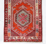 Vintage Turkish runner rug in a living room setting, pile rug, Turkish rug, vintage rug, portland, rug shop, bright colors, wild shaman, soft rug, bold color, Portland, Oregon, rug store, rug shop, local shop,