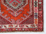Vintage Turkish runner rug in a living room setting, pile rug, Turkish rug, vintage rug, portland, rug shop, bright colors, wild shaman, soft rug, bold color, Portland, Oregon, rug store, rug shop, local shop,