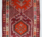 Vintage Turkish runner rug in a living room setting, pile rug, Turkish rug, vintage rug, portland, rug shop, bright colors, wild shaman, soft rug, bold color, Portland, Oregon, rug store, rug shop, local shop,