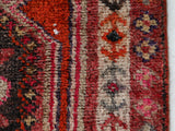 Vintage Turkish runner rug in a living room setting, pile rug, Turkish rug, vintage rug, portland, rug shop, bright colors, wild shaman, soft rug, bold color, Portland, Oregon, rug store, rug shop, local shop,