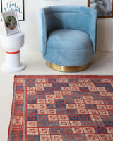 Vintage kilim rug in room decor setting, old rug, antique rug, pastel colors, faded colors, Turkish rug, vintage rug, soft rug, Portland, Oregon, rug store, rug shop, local shop, bold colors, bright colors, faded colors