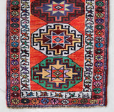 Vintage Turkish runner rug in a living room setting, pile rug, Turkish rug, vintage rug, portland, rug shop, bright colors, wild shaman, soft rug, bold color, Portland, Oregon, rug store, rug shop, local shop