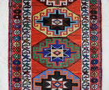 Vintage Turkish runner rug in a living room setting, pile rug, Turkish rug, vintage rug, portland, rug shop, bright colors, wild shaman, soft rug, bold color, Portland, Oregon, rug store, rug shop, local shop