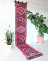 Vintage Turkish runner rug in a living room setting, pile rug, Turkish rug, vintage rug, portland, rug shop, bright colors, wild shaman, soft rug, bold color, Portland, Oregon, rug store, rug shop, local shop