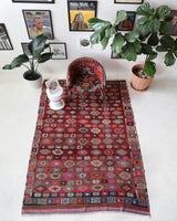 Vintage kilim rug in room decor setting, old rug, antique rug, pastel colors, faded colors, Turkish rug, vintage rug, soft rug, Portland, Oregon, rug store, rug shop, local shop, bold colors, bright colors, faded colors