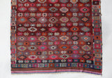Vintage kilim rug in room decor setting, old rug, antique rug, pastel colors, faded colors, Turkish rug, vintage rug, soft rug, Portland, Oregon, rug store, rug shop, local shop, bold colors, bright colors, faded colors