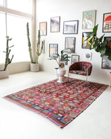 Vintage kilim rug in room decor setting, old rug, antique rug, pastel colors, faded colors, Turkish rug, vintage rug, soft rug, Portland, Oregon, rug store, rug shop, local shop, bold colors, bright colors, faded colors