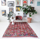 Vintage kilim rug in room decor setting, old rug, antique rug, pastel colors, faded colors, Turkish rug, vintage rug, soft rug, Portland, Oregon, rug store, rug shop, local shop, bold colors, bright colors, faded colors