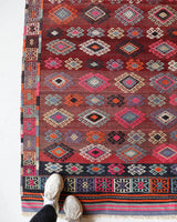 Vintage kilim rug in room decor setting, old rug, antique rug, pastel colors, faded colors, Turkish rug, vintage rug, soft rug, Portland, Oregon, rug store, rug shop, local shop, bold colors, bright colors, faded colors