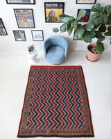 Vintage kilim rug in living room setting, bright colors, wild shaman, soft rug, bold color, Portland, Oregon, rug store, rug shop, local shop, vintage rug, modern kilim, warm colors