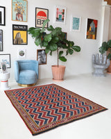 Vintage kilim rug in living room setting, bright colors, wild shaman, soft rug, bold color, Portland, Oregon, rug store, rug shop, local shop, vintage rug, modern kilim, warm colors