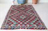 Vintage kilim rug in room decor setting, old rug, antique rug, pastel colors, faded colors, Turkish rug, vintage rug, soft rug, Portland, Oregon, rug store, rug shop, local shop, bold colors, bright colors, faded colors