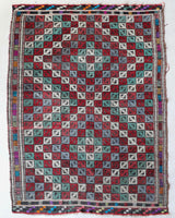 Vintage kilim rug in room decor setting, old rug, antique rug, pastel colors, faded colors, Turkish rug, vintage rug, soft rug, Portland, Oregon, rug store, rug shop, local shop, bold colors, bright colors, faded colors