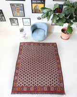 Vintage kilim rug in room decor setting, old rug, antique rug, pastel colors, faded colors, Turkish rug, vintage rug, soft rug, Portland, Oregon, rug store, rug shop, local shop, bold colors, bright colors, faded colors