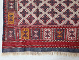 Vintage kilim rug in room decor setting, old rug, antique rug, pastel colors, faded colors, Turkish rug, vintage rug, soft rug, Portland, Oregon, rug store, rug shop, local shop, bold colors, bright colors, faded colors