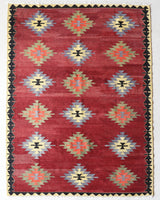 Vintage kilim rug in room decor setting, old rug, antique rug, pastel colors, faded colors, Turkish rug, vintage rug, soft rug, Portland, Oregon, rug store, rug shop, local shop, bold colors, bright colors, faded colors