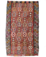 Vintage kilim rug in living room setting, bright colors, wild shaman, soft rug, bold color, Portland, Oregon, rug store, rug shop, local shop, vintage rug, modern kilim, warm colors